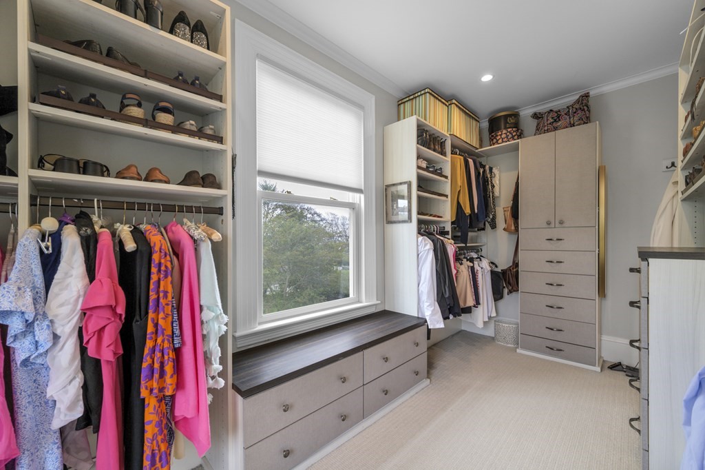 346 Ocean Avenue Marblehead, MA 01945 - Photo 31 of 42 a view of walk in closet with clothes and shoes