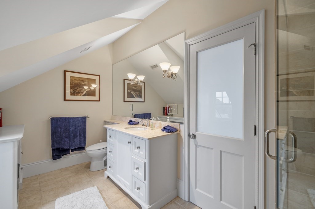 346 Ocean Avenue Marblehead, MA 01945 - Photo 40 of 42 a view of bathroom with mirror and window