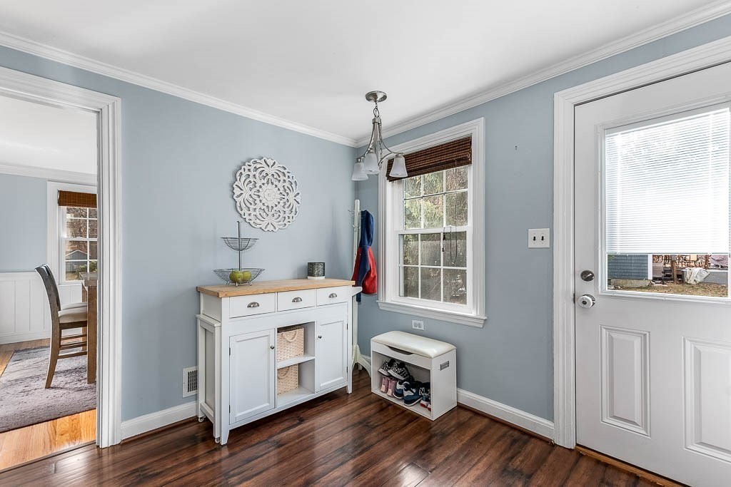 61 Ledgewood Road Dedham, MA 02026 - Photo 13 of 41 a room with furniture a window and wooden floor
