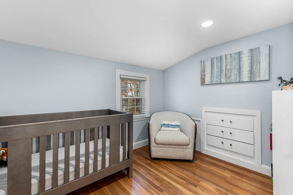 61 Ledgewood Road Dedham, MA 02026 - Photo 20 of 41 a bedroom with furniture and a window