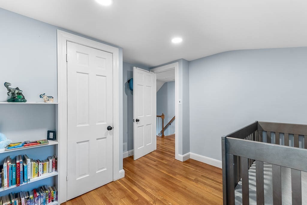 61 Ledgewood Road Dedham, MA 02026 - Photo 21 of 41 a view of an empty room and wooden floor