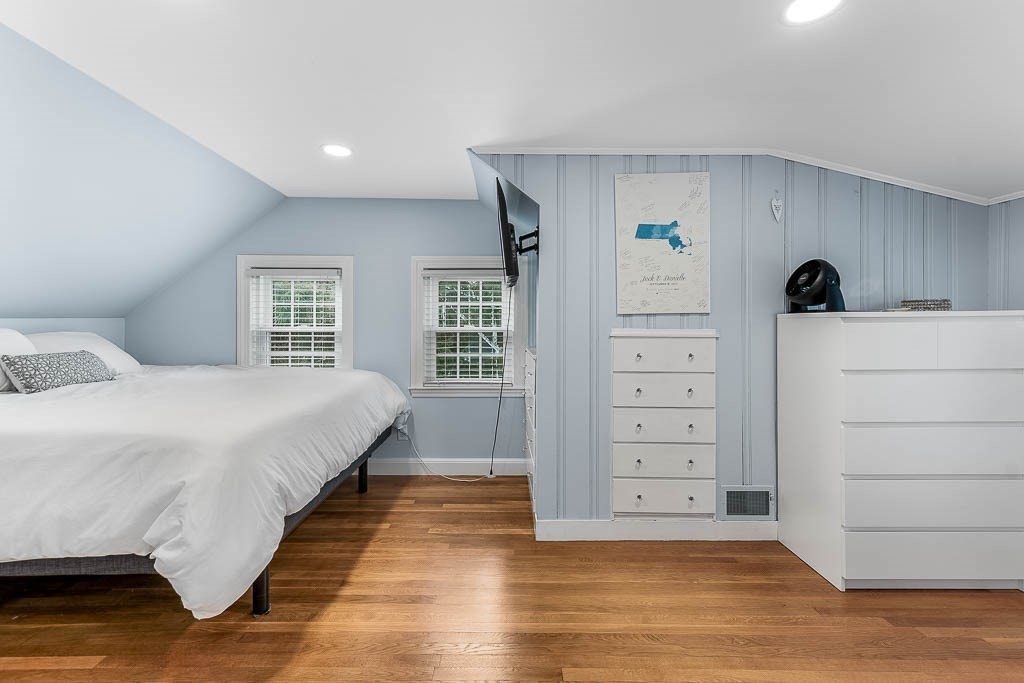 61 Ledgewood Road Dedham, MA 02026 - Photo 23 of 41 a spacious bedroom with a bed and a window