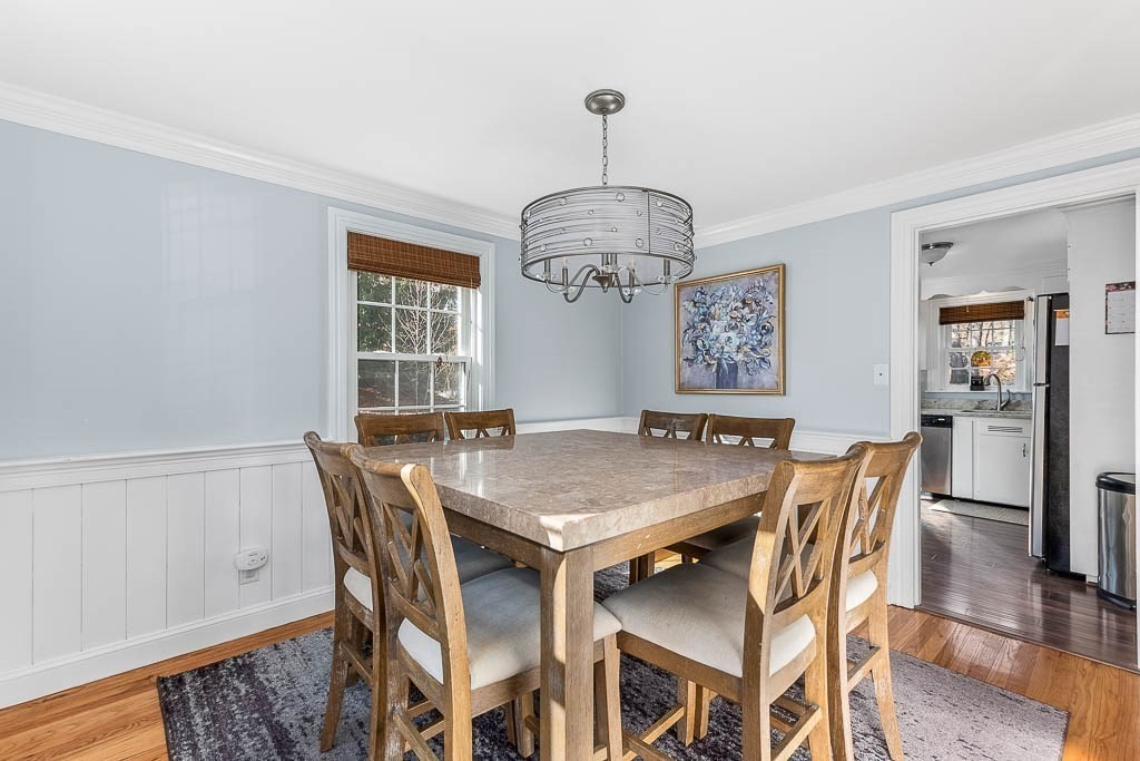 61 Ledgewood Road Dedham, MA 02026 - Photo 8 of 41 a view of a dining room with furniture window and wooden floor