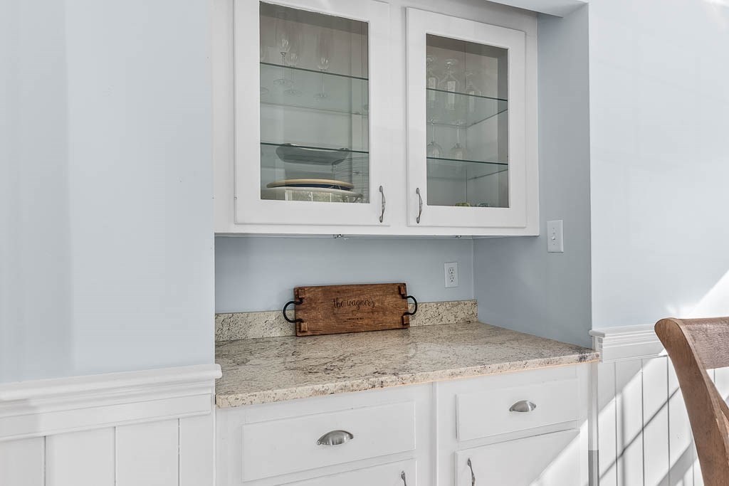 61 Ledgewood Road Dedham, MA 02026 - Photo 10 of 41 a kitchen with a sink and cabinets