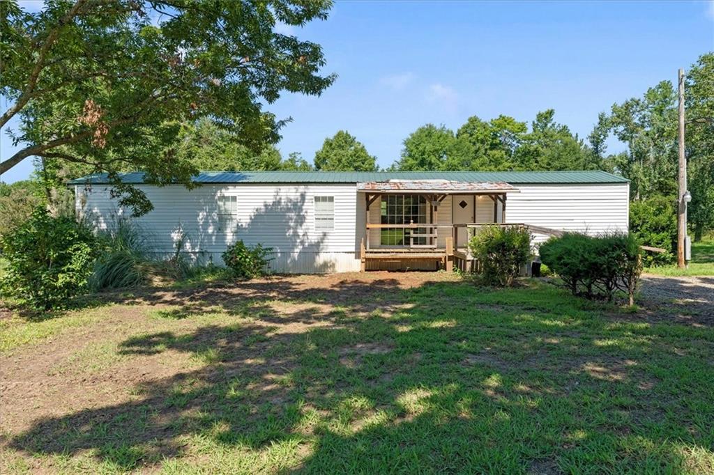 170 Anoia Road Washington, GA 30673 - Photo 39 of 46 a view front of house with backyard and trees