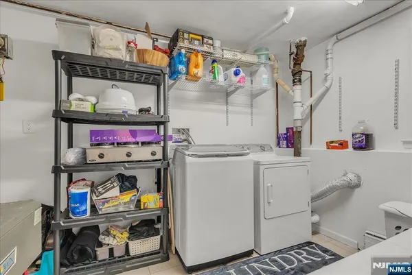 a view of a swimming pool with an outdoor seating and a yard