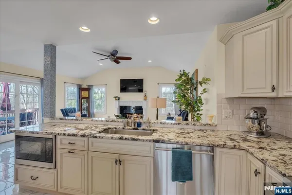 a view of a dining area with furniture window and wooden floor