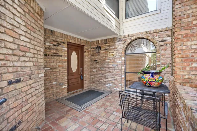 a front view of a house with outdoor space