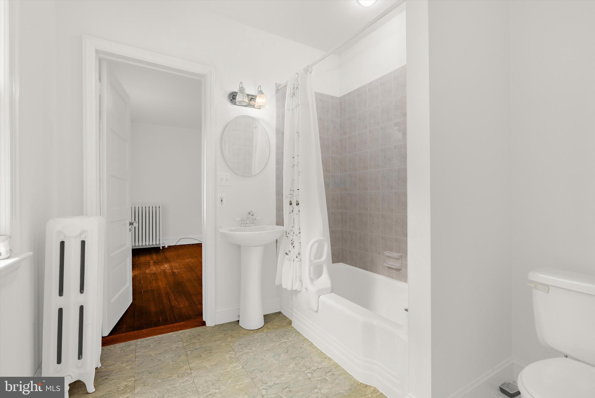 500 Nesbit Road Queenstown, MD 21658 - Photo 23 of 53 a bathroom with a bathtub and a shower