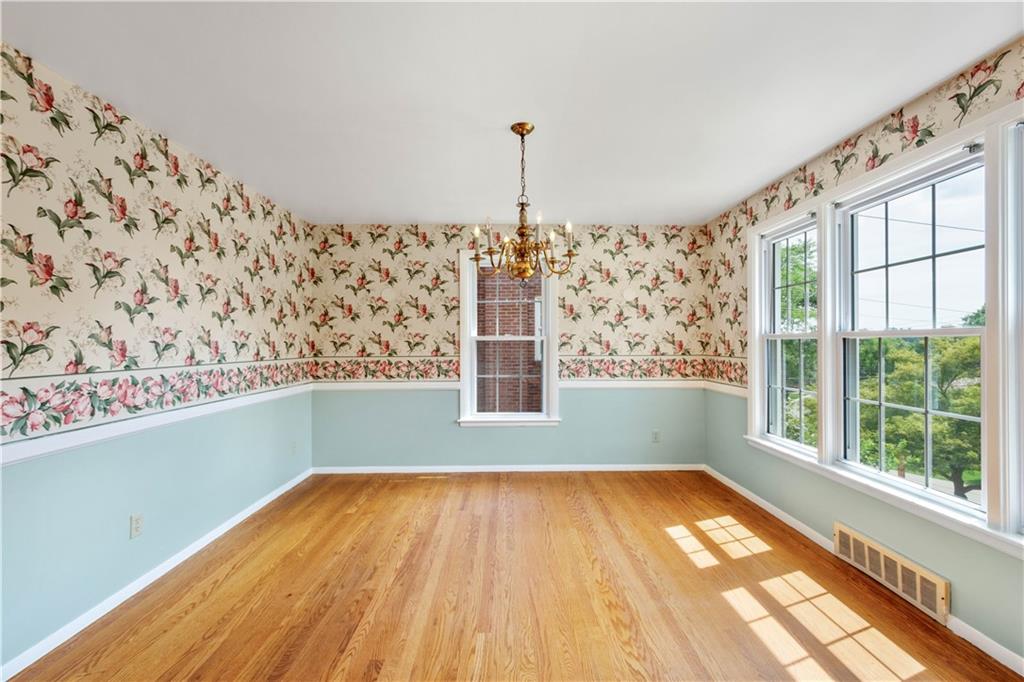 1413 Terrace Drive Pittsburgh, PA 15228 - Photo 12 of 50 a view of a room with window wooden floor and brick walls