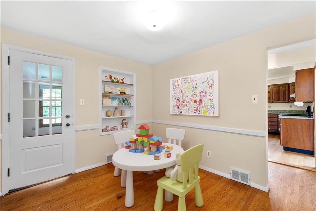 1413 Terrace Drive Pittsburgh, PA 15228 - Photo 27 of 50 a view of a dining room with furniture and wooden floor