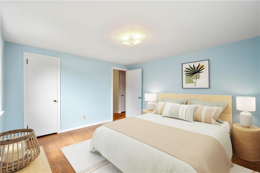 1413 Terrace Drive Pittsburgh, PA 15228 - Photo 38 of 50 a bedroom with a bed and a lamp