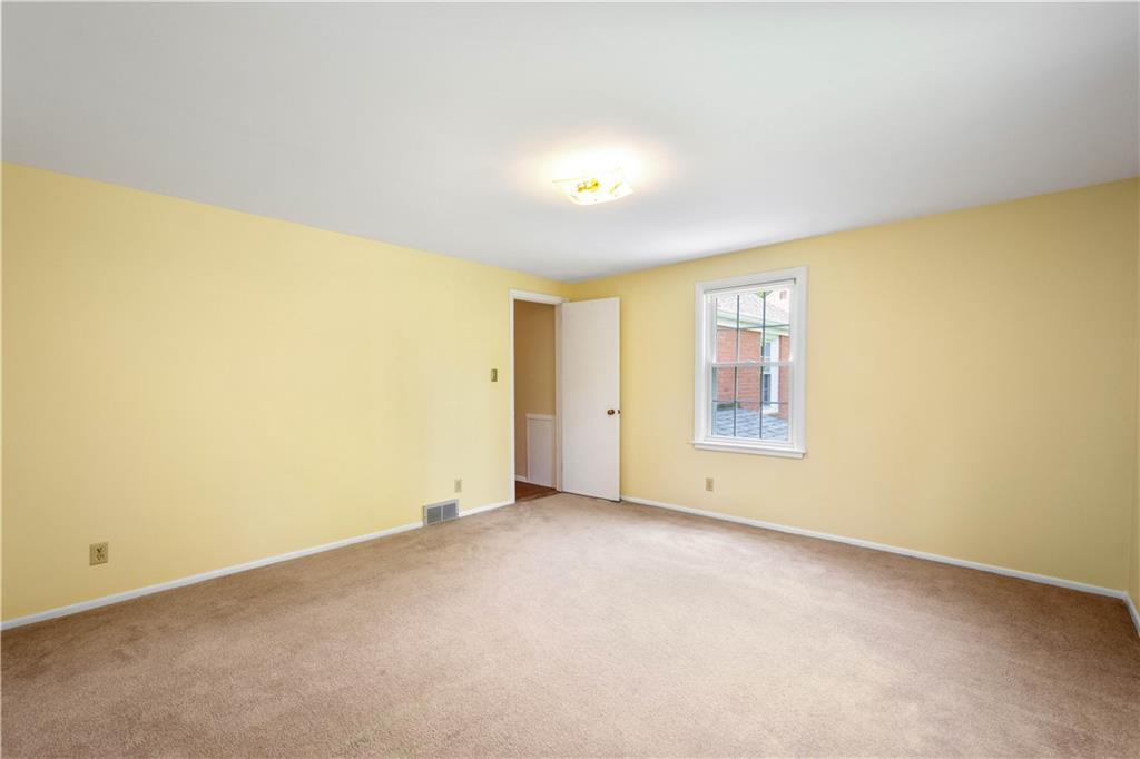 1413 Terrace Drive Pittsburgh, PA 15228 - Photo 46 of 50 an empty room with a empty space and a window