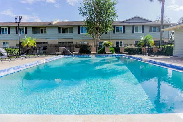 a front view of house with yard and outdoor seating