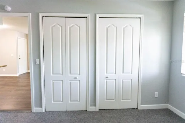 view of empty room with windows