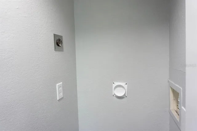 a view of bathroom with toilet and shower