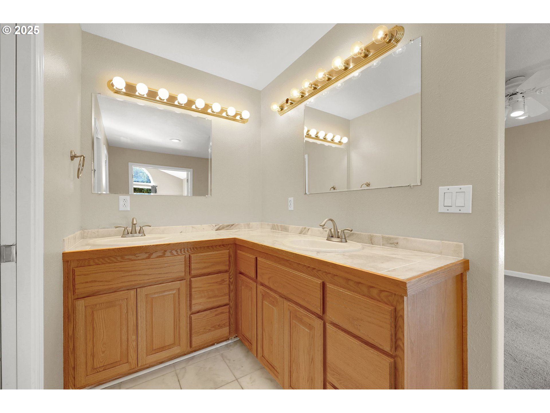 1587 Manchester Drive Eugene, OR 97401 - Photo 29 of 31 a bathroom with a sink and a mirror