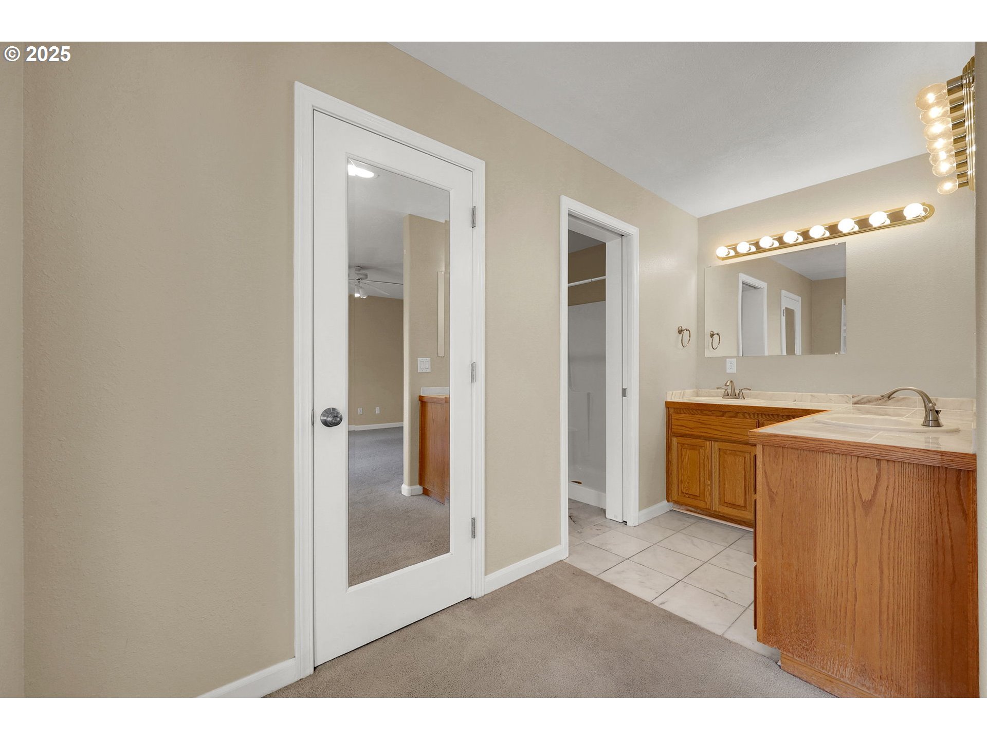 1587 Manchester Drive Eugene, OR 97401 - Photo 30 of 31 a view of a bathroom with sink mirror and bathtub