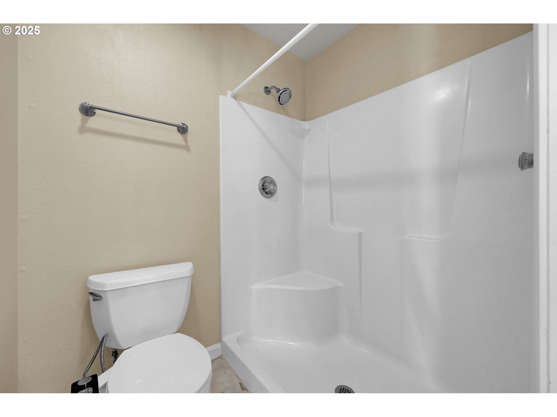 1587 Manchester Drive Eugene, OR 97401 - Photo 31 of 31 a bathroom with a toilet and a shower