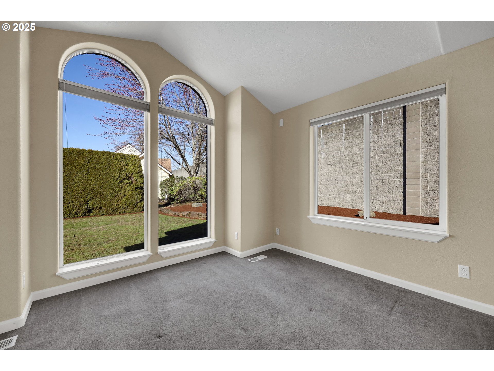 1587 Manchester Drive Eugene, OR 97401 - Photo 4 of 31 a view of an empty room with a window