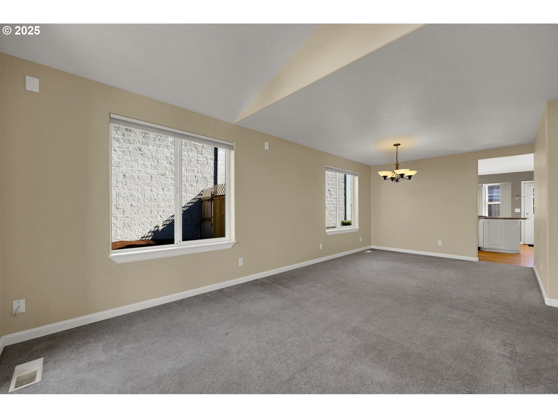 1587 Manchester Drive Eugene, OR 97401 - Photo 5 of 31 a view of an empty room with a window