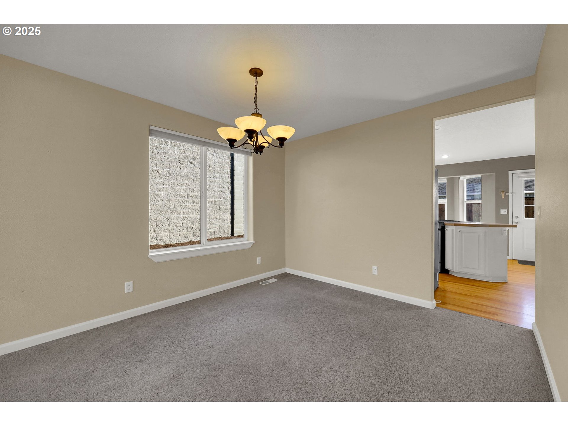 1587 Manchester Drive Eugene, OR 97401 - Photo 6 of 31 a view of an empty room with a window