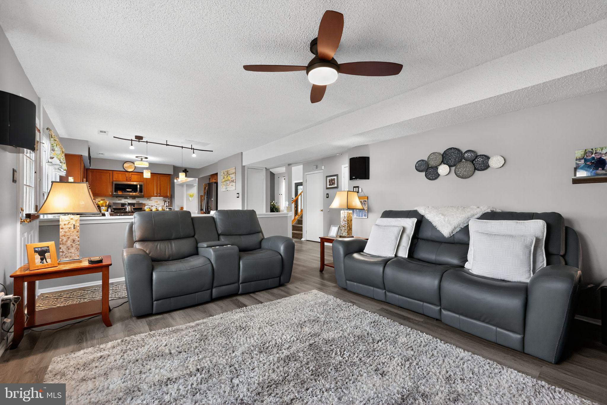 11 Pony Run Sewell, NJ 08080 - Photo 15 of 33 a living room with furniture and a ceiling fan
