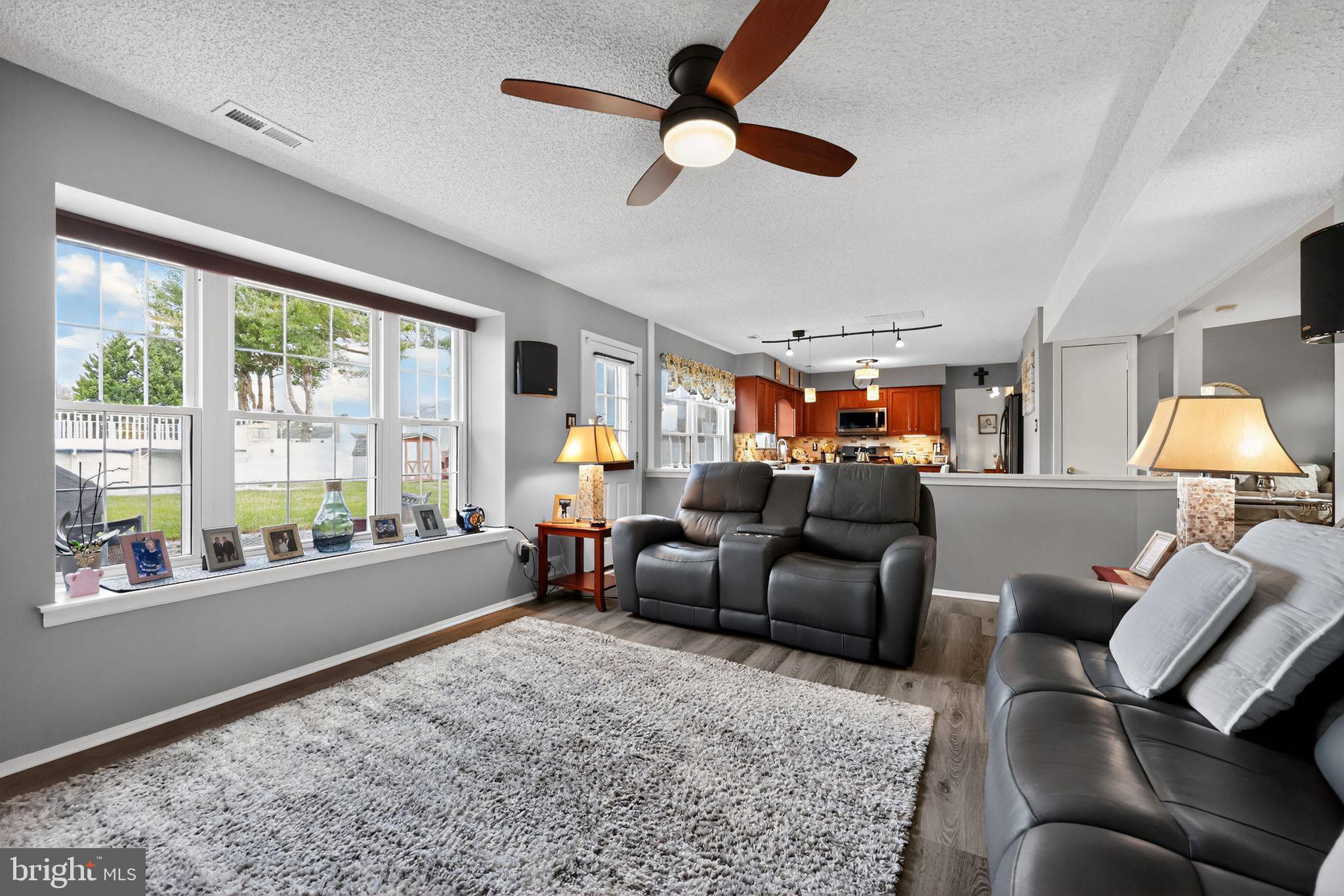 11 Pony Run Sewell, NJ 08080 - Photo 17 of 33 a living room with furniture and a large window