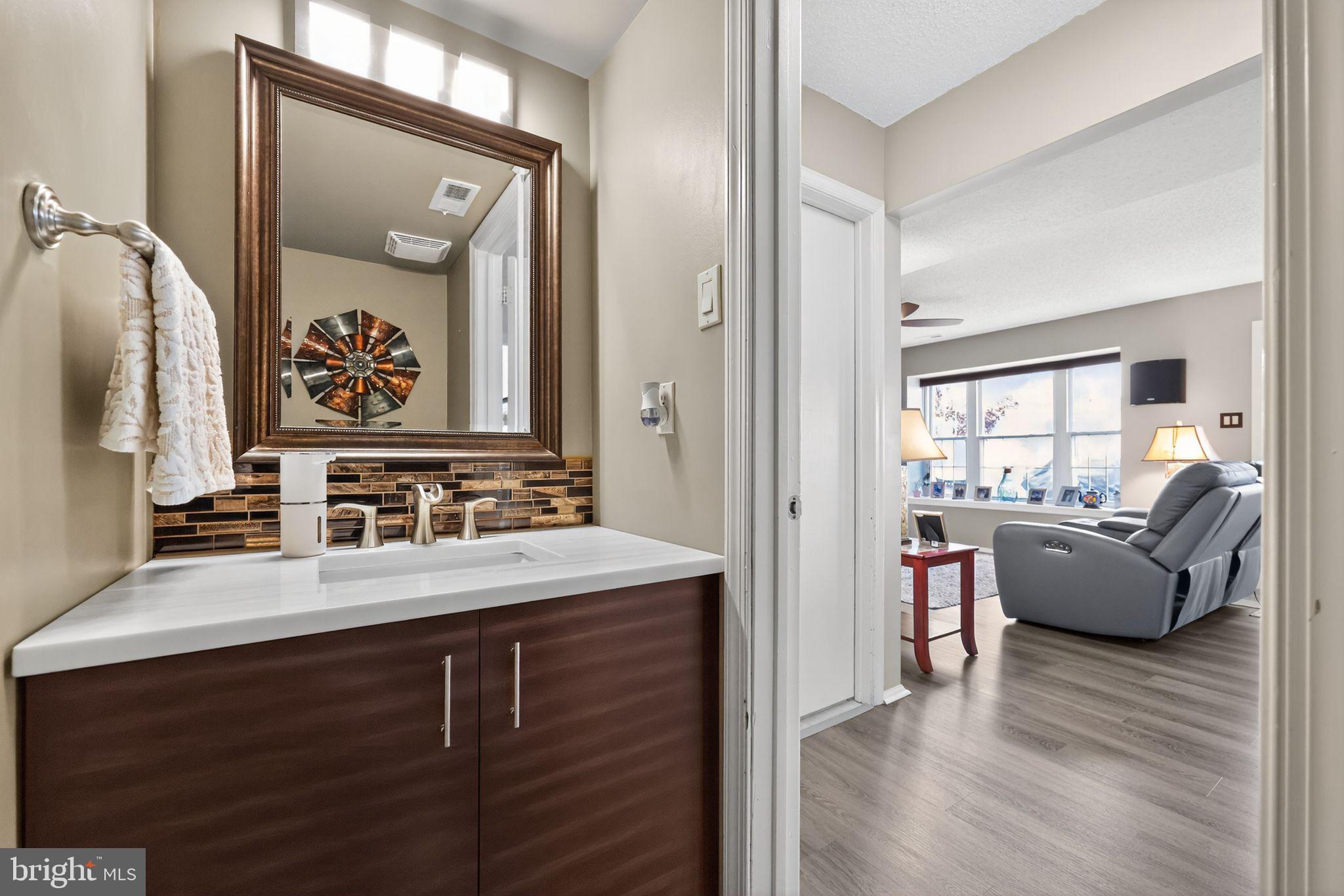 11 Pony Run Sewell, NJ 08080 - Photo 18 of 33 a en suite bathroom with a granite countertop tub sink and mirror