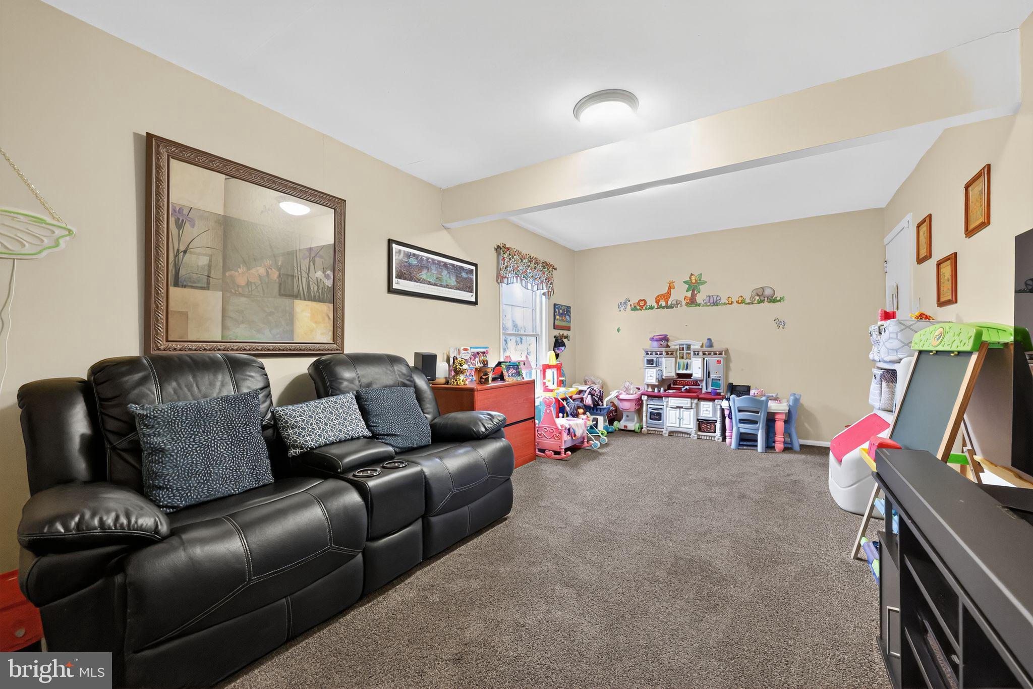 11 Pony Run Sewell, NJ 08080 - Photo 20 of 33 a living room with furniture and a flat screen tv