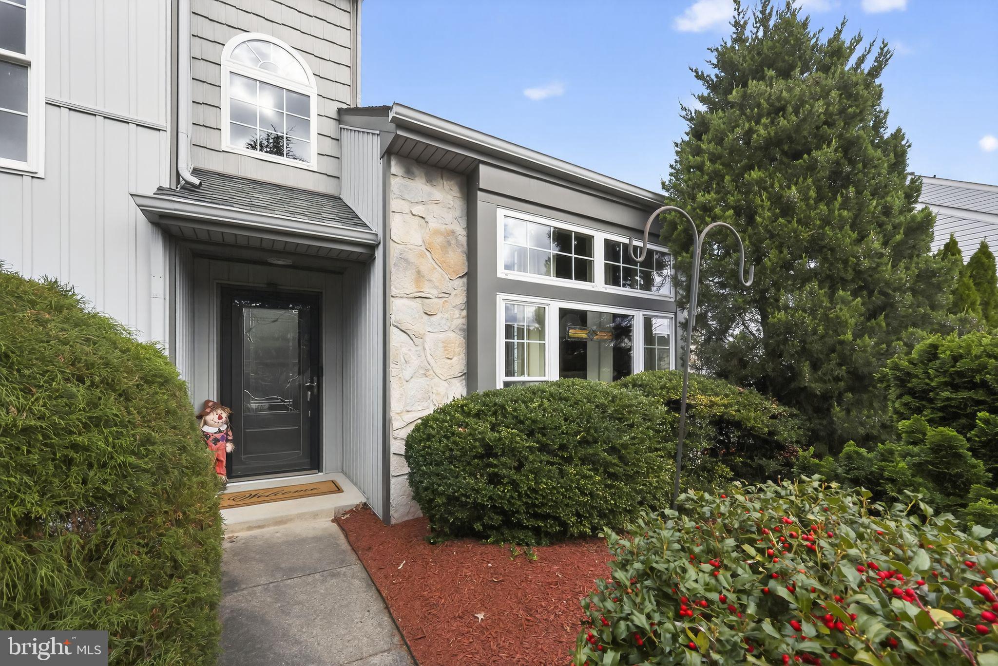11 Pony Run Sewell, NJ 08080 - Photo 4 of 33 a front view of a house with garden