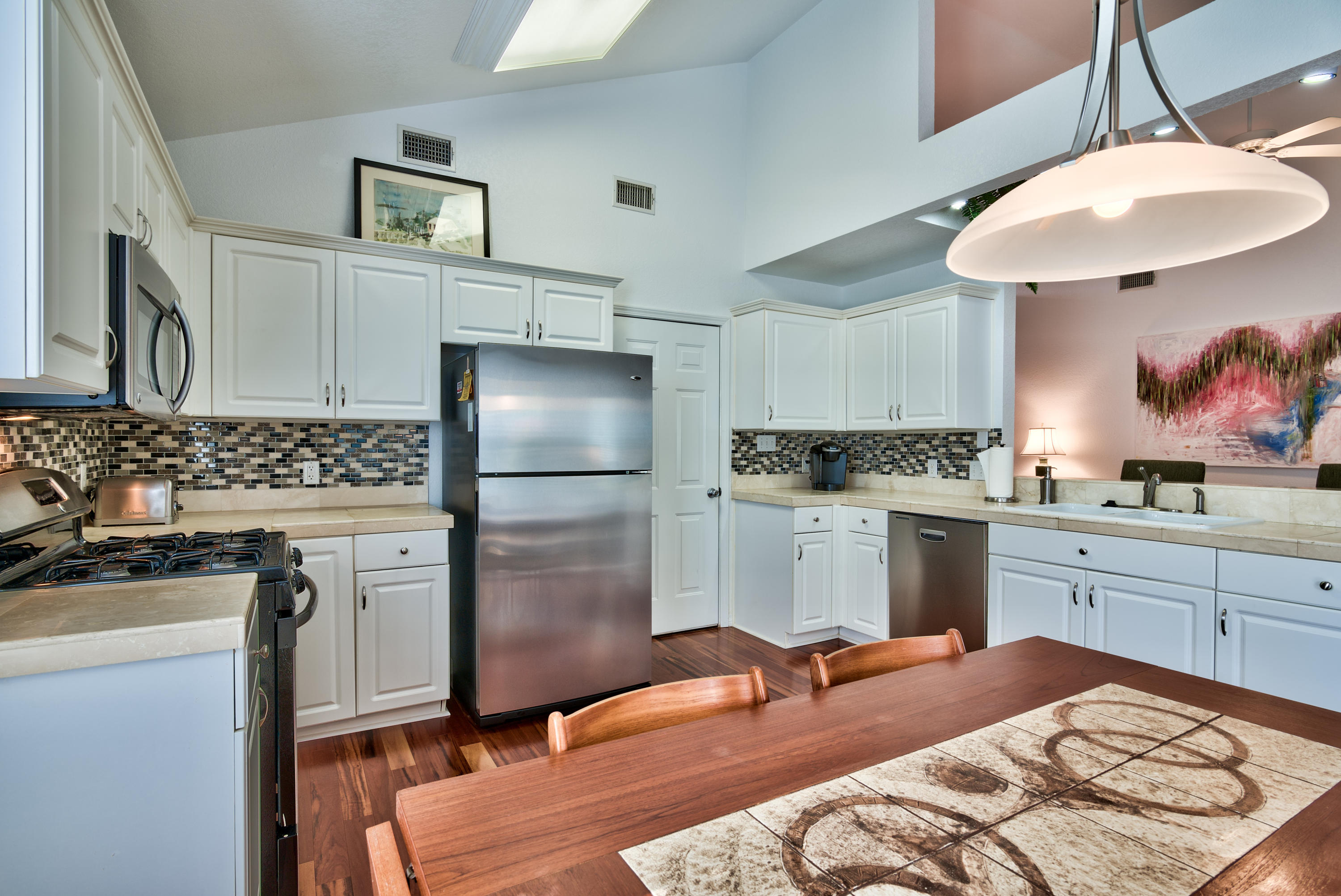 77 Legion Park Loop Miramar Beach, FL 32550 - Photo 15 of 25 a kitchen with a refrigerator stove and sink