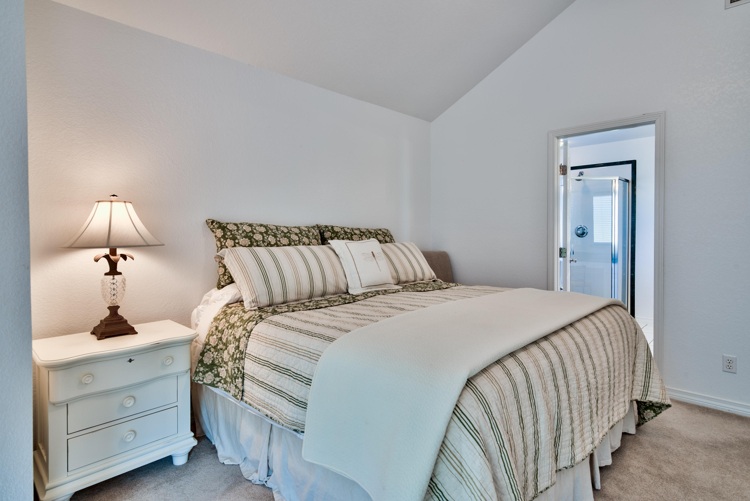 77 Legion Park Loop Miramar Beach, FL 32550 - Photo 18 of 25 a bedroom with a bed and a lamp