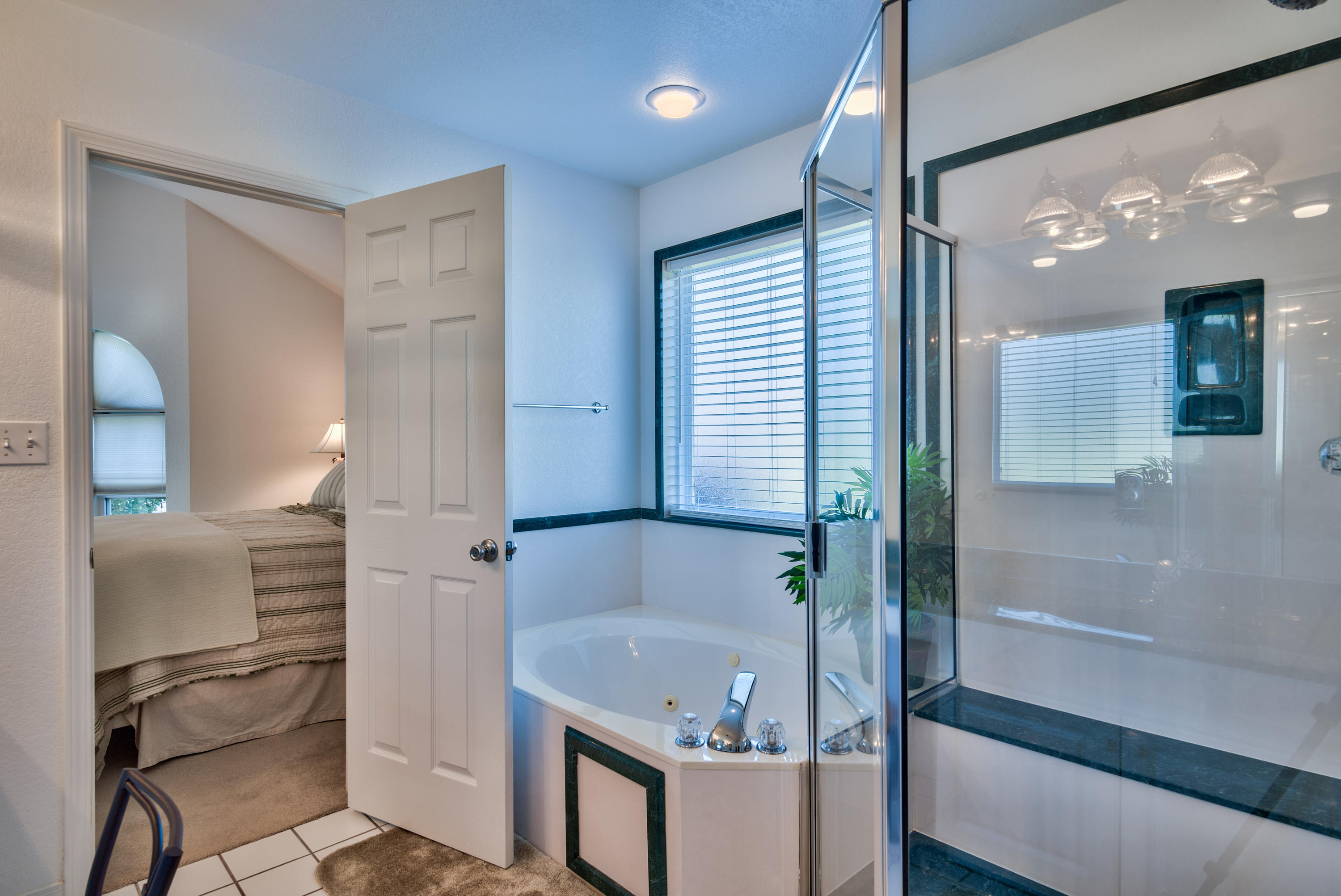 77 Legion Park Loop Miramar Beach, FL 32550 - Photo 21 of 25 a bathroom with a tub and shower