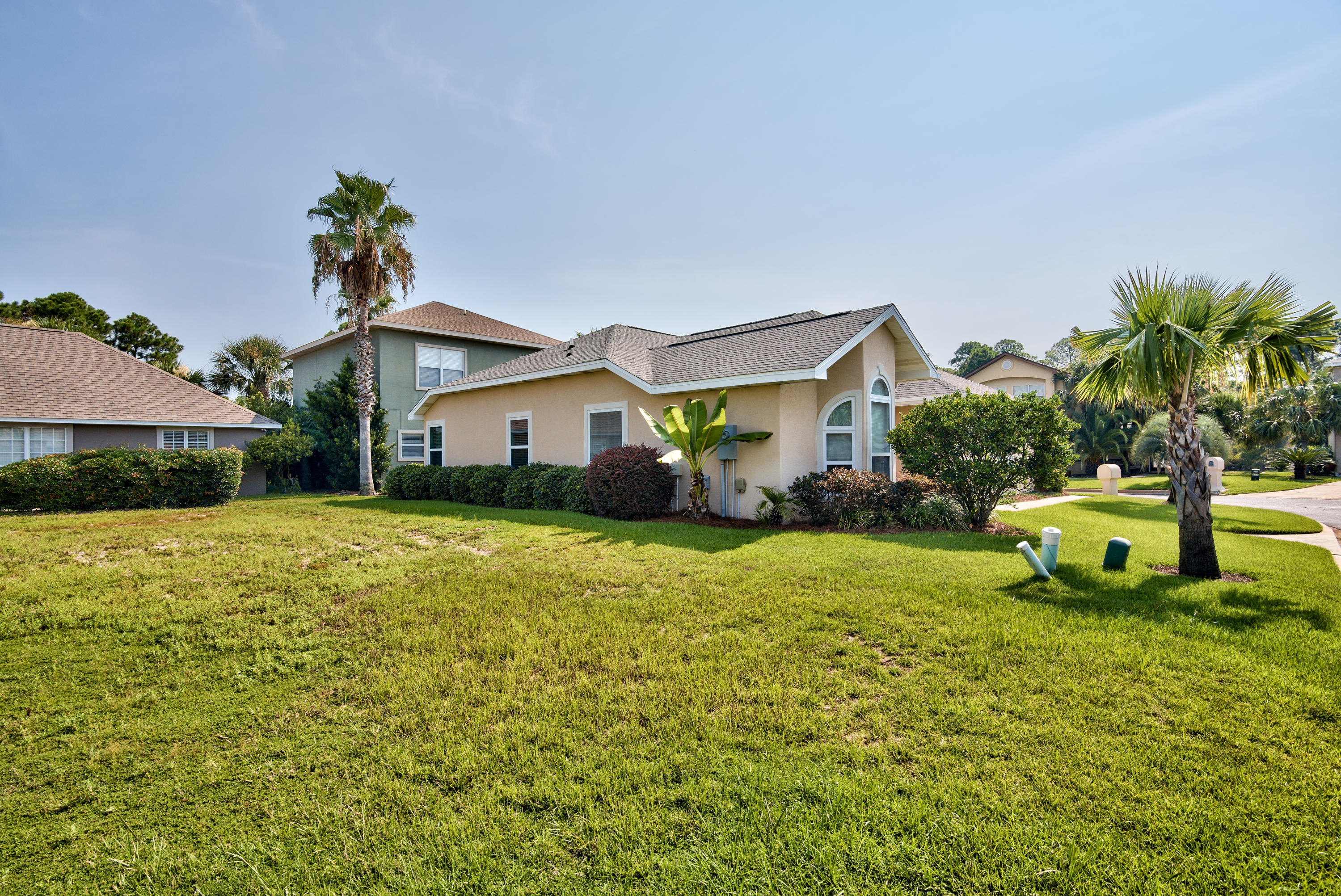 77 Legion Park Loop Miramar Beach, FL 32550 - Photo 5 of 25 a front view of a house with garden