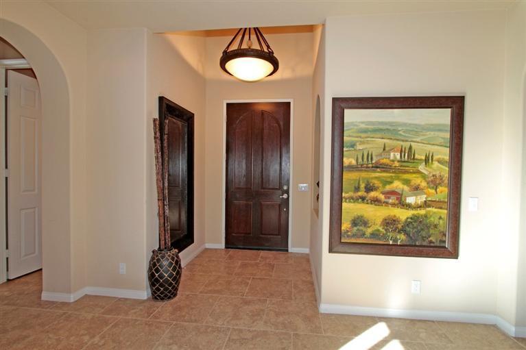 3 Via Santa Elena Rancho Mirage, CA 92270 - Photo 12 of 33 a view of a livingroom with a dinning table and chair