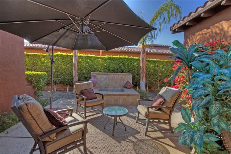3 Via Santa Elena Rancho Mirage, CA 92270 - Photo 14 of 33 a patio with a patio table and chairs
