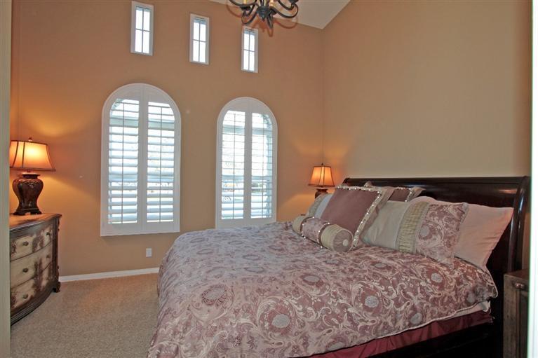3 Via Santa Elena Rancho Mirage, CA 92270 - Photo 26 of 33 a bedroom with a bed and a window