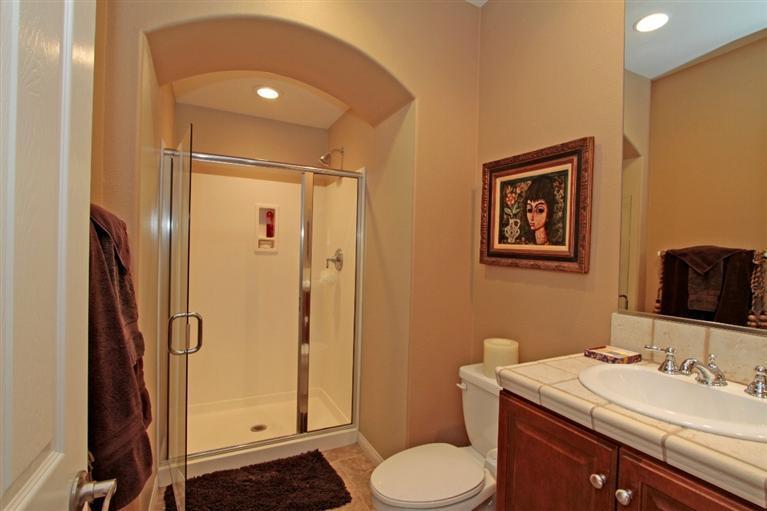 3 Via Santa Elena Rancho Mirage, CA 92270 - Photo 27 of 33 a bathroom with a granite countertop sink toilet and shower