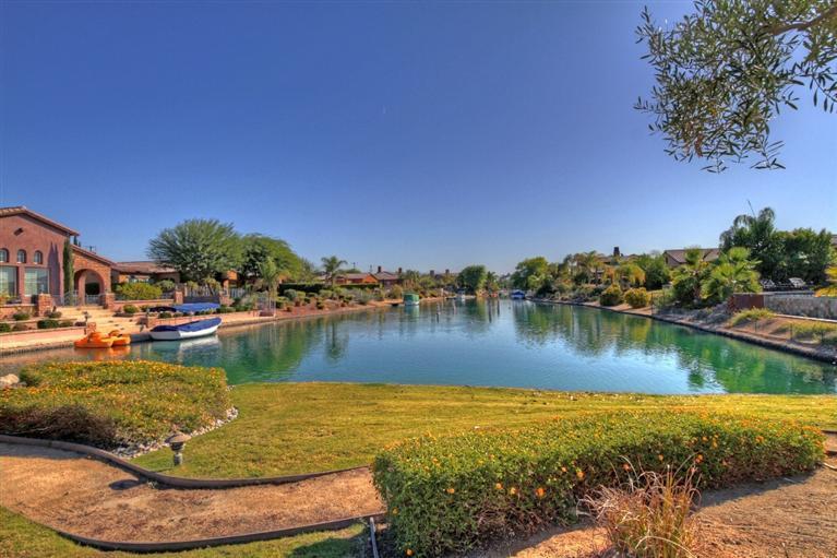3 Via Santa Elena Rancho Mirage, CA 92270 - Photo 33 of 33 a view of a lake with houses in the back