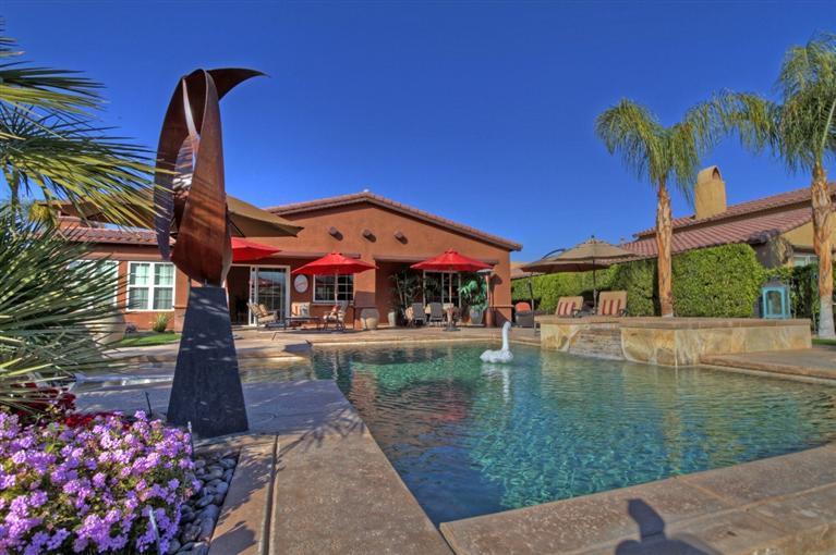 3 Via Santa Elena Rancho Mirage, CA 92270 - Photo 4 of 33 a front view of a house with garden