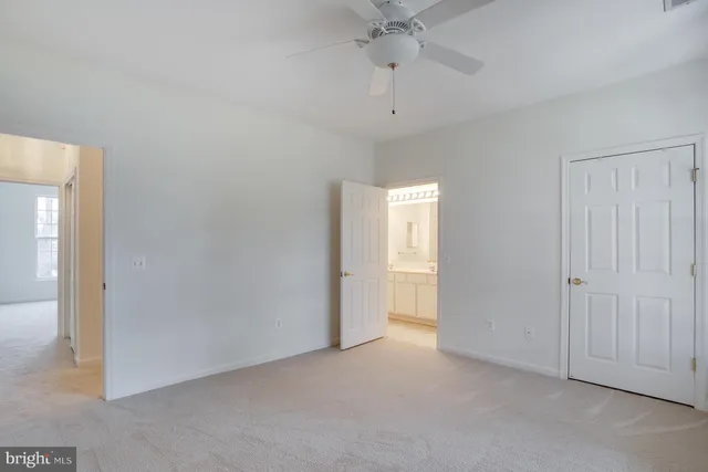 an empty room with fan
