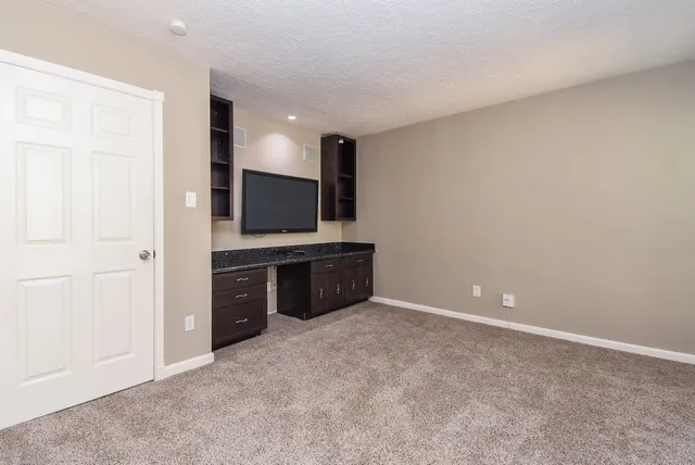 a view of a kitchen with electric appliances