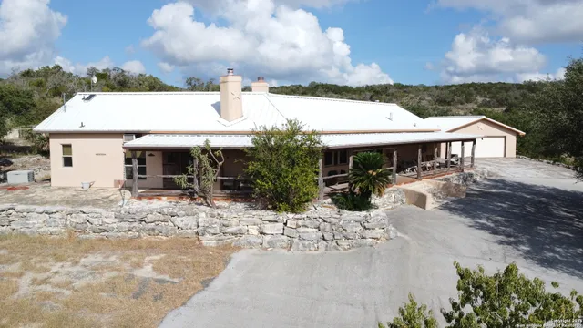 a view of a floor to ceiling window with backyard view