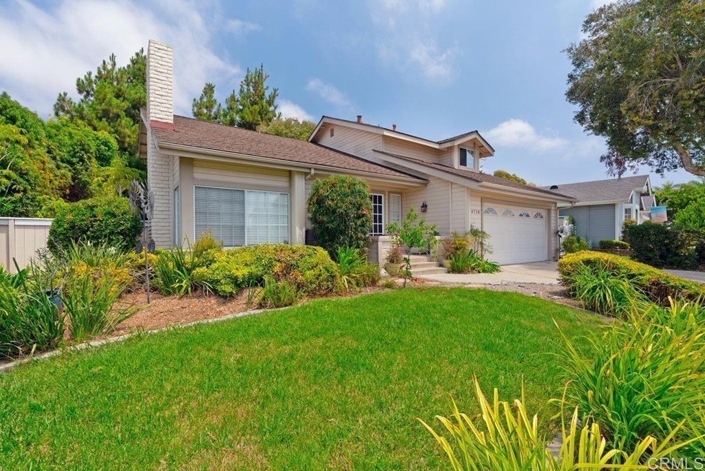 4738 Gateshead Road Carlsbad, CA 92010 - Photo 2 of 36 a front view of a house with garden