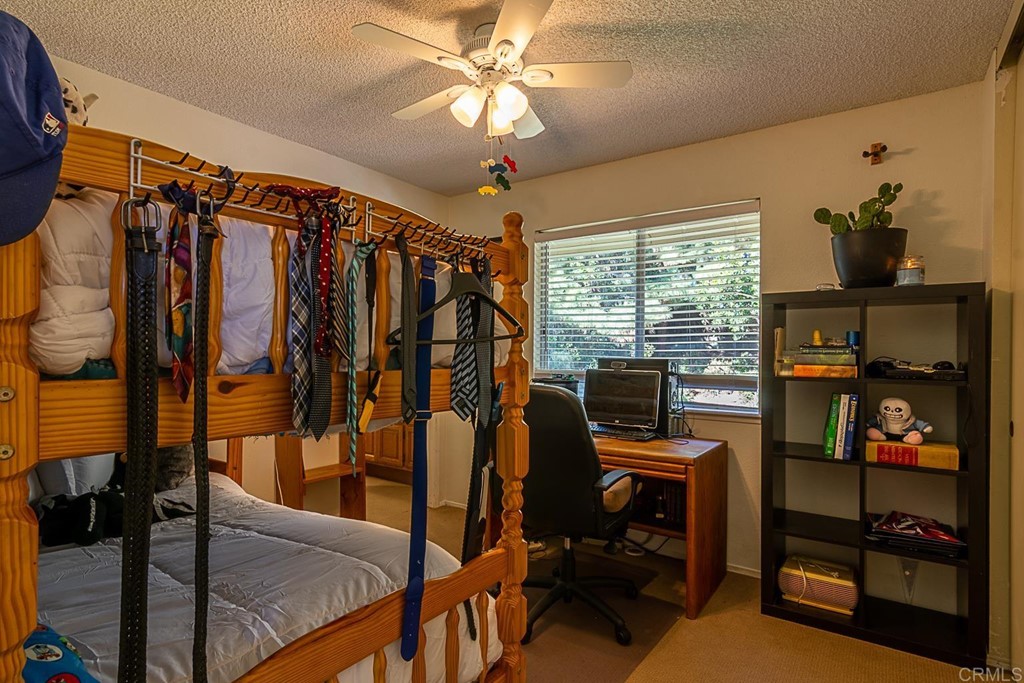 4738 Gateshead Road Carlsbad, CA 92010 - Photo 27 of 36 a view of a livingroom with furniture and a window