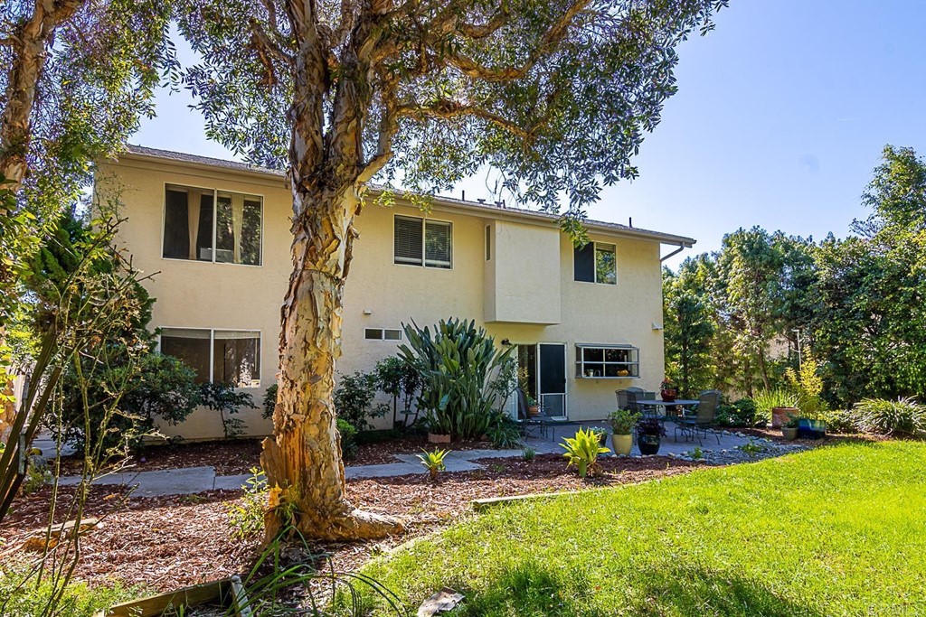 4738 Gateshead Road Carlsbad, CA 92010 - Photo 32 of 36 a view of a house with backyard and sitting area