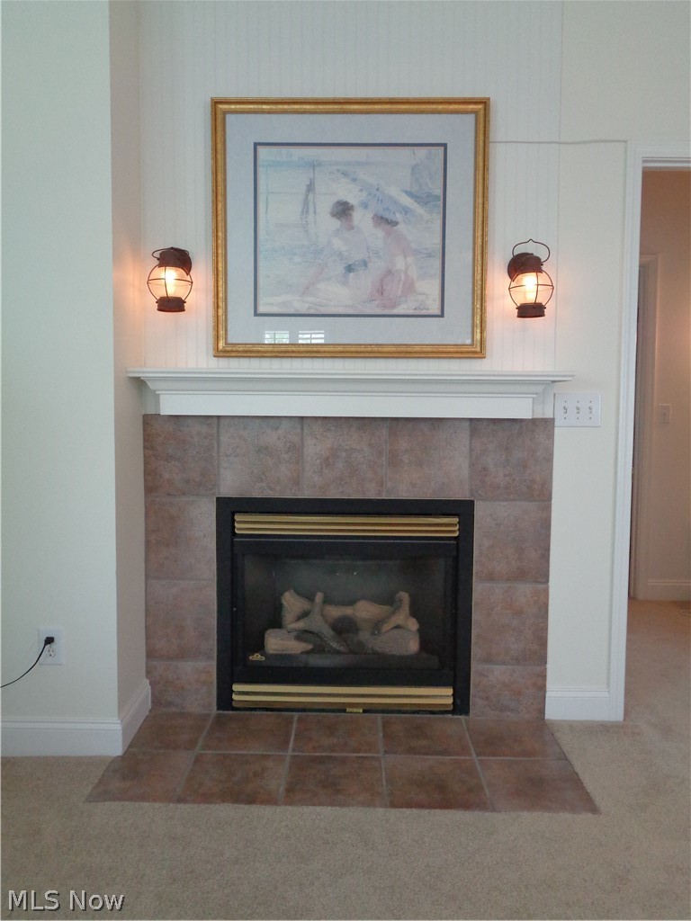 4611 Cleveland Road East, Unit 922 Huron, OH 44839 - Photo 23 of 34 Master bedroom gas fireplace.