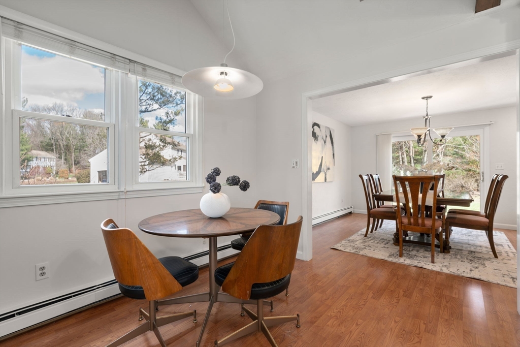 16 Blacksmith Drive Medfield, MA 02052 - Photo 11 of 40 a dining room with furniture a window and wooden floor