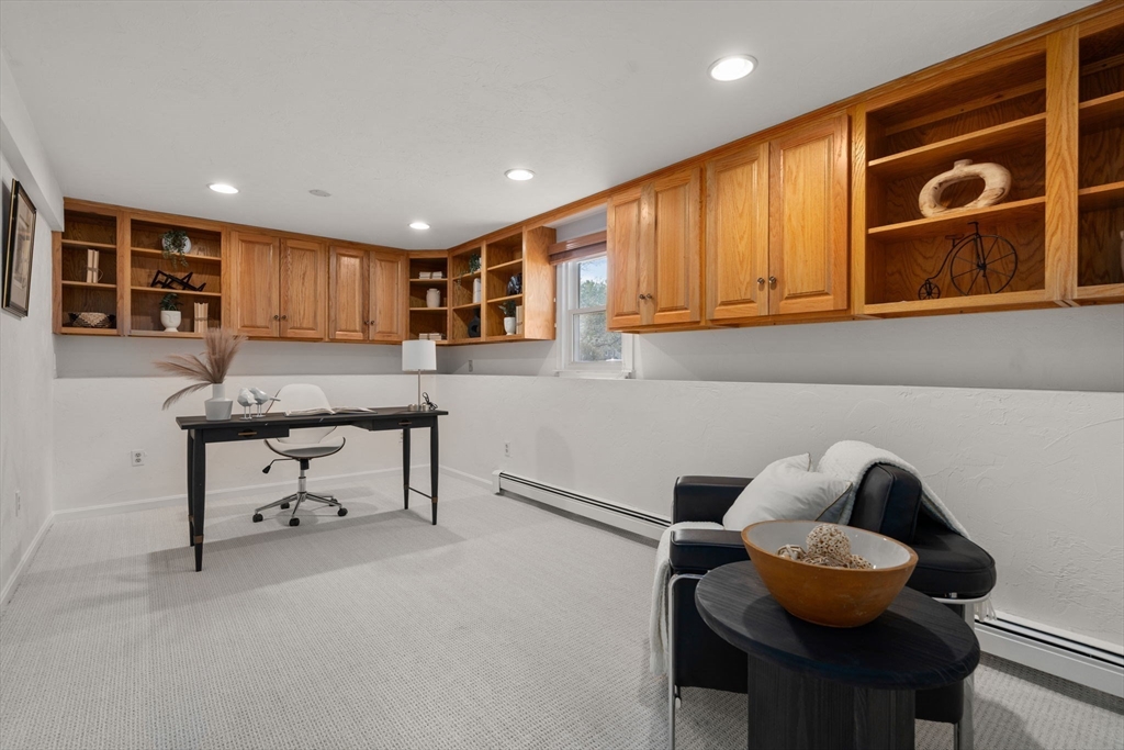 16 Blacksmith Drive Medfield, MA 02052 - Photo 26 of 40 a workspace with furniture and window